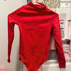 skims red bodysuit